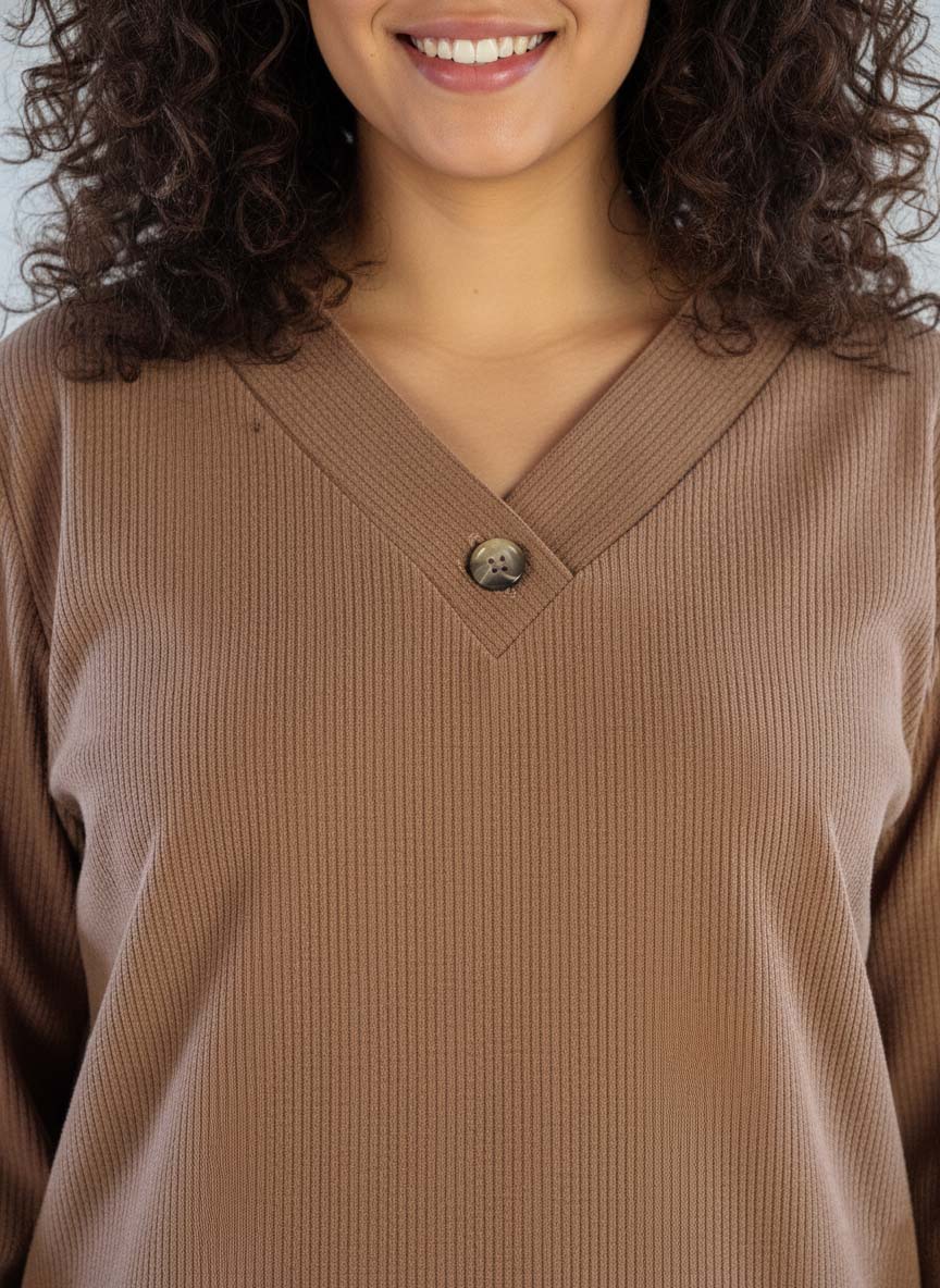 Casual beige flannel-style set with trousers and V-neck top